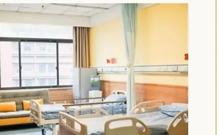 Private inpatient room with adjustable beds at HYGEIA